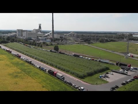 Homeowners in Poland queue for days to buy fuel