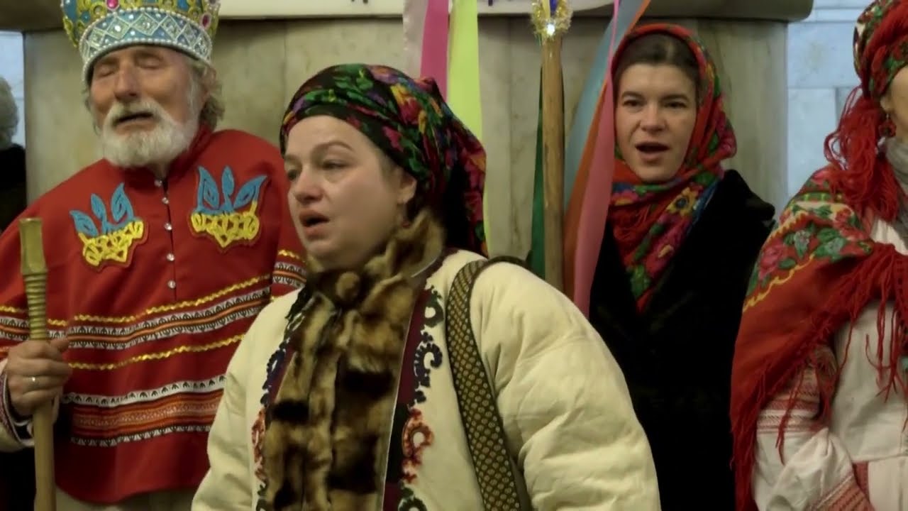 Kyiv residents sing Christmas carols in a metro station amid air raid alarm
